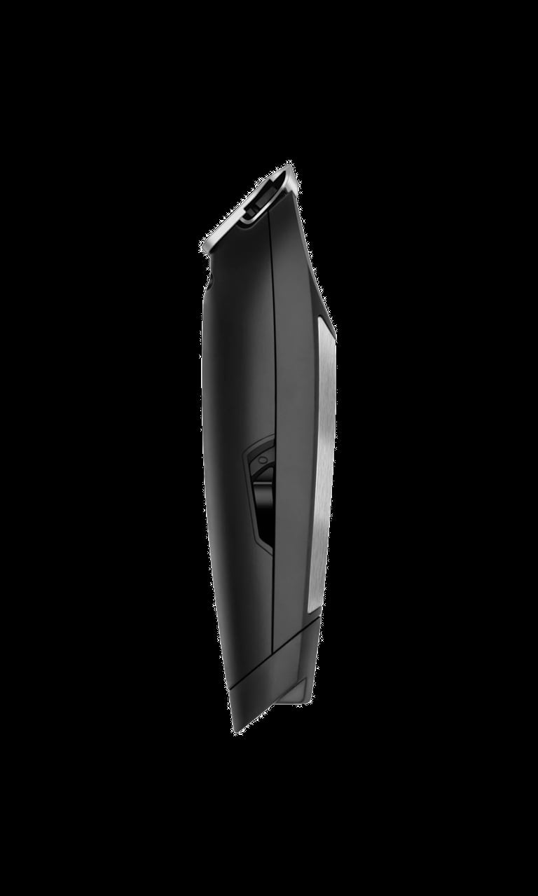 Black and silver cordless hair clipper with textured handle, side angle